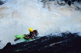 Chris Gragtmans exiting the Mini-Gorge on the Whitewater River. Photo credit Spencer Cooke, 